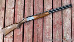 12 gauge over/under shotgun with double triggers and 28" barrels, manufactured by Boito for KMart