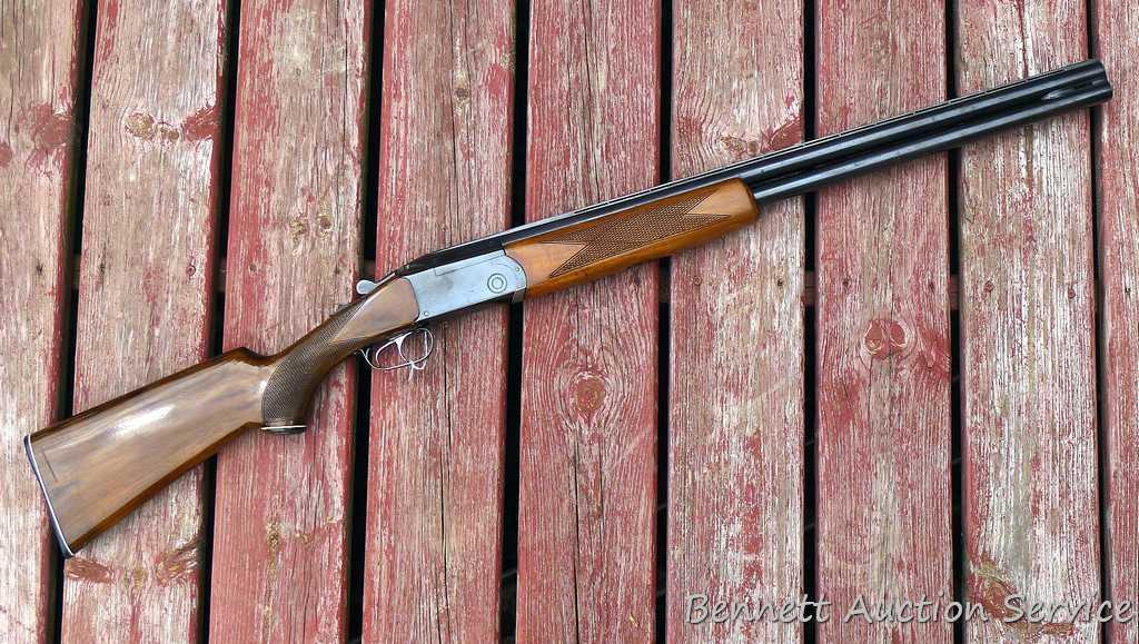 12 gauge over/under shotgun with double triggers and 28" barrels, manufactured by Boito for KMart