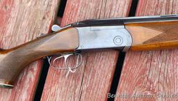 12 gauge over/under shotgun with double triggers and 28" barrels, manufactured by Boito for KMart