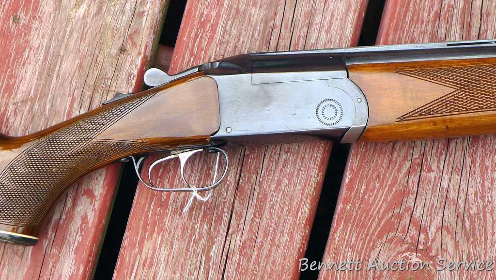 12 gauge over/under shotgun with double triggers and 28" barrels, manufactured by Boito for KMart