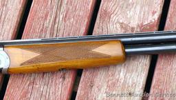 12 gauge over/under shotgun with double triggers and 28" barrels, manufactured by Boito for KMart