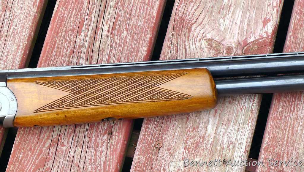 12 gauge over/under shotgun with double triggers and 28" barrels, manufactured by Boito for KMart