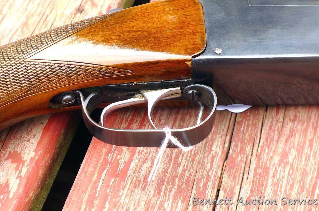 12 gauge over/under shotgun with double triggers and 28" barrels, manufactured by Boito for KMart