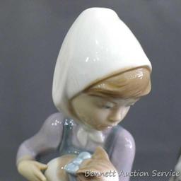 Lladro girl with dalmatian and cat figurine, marked 5032, D-20 E. Stands 7". In very good condition