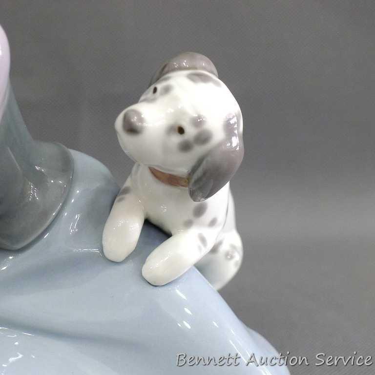 Lladro girl with dalmatian and cat figurine, marked 5032, D-20 E. Stands 7". In very good condition