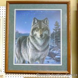 Night Watch wolf print is nicely framed and matted, signed by James Meger and is numbered 1193/2500.