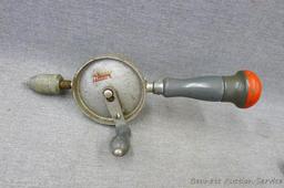 Handyman hand drill, another hand drill and two scribers. Handyman drill is 12" long.