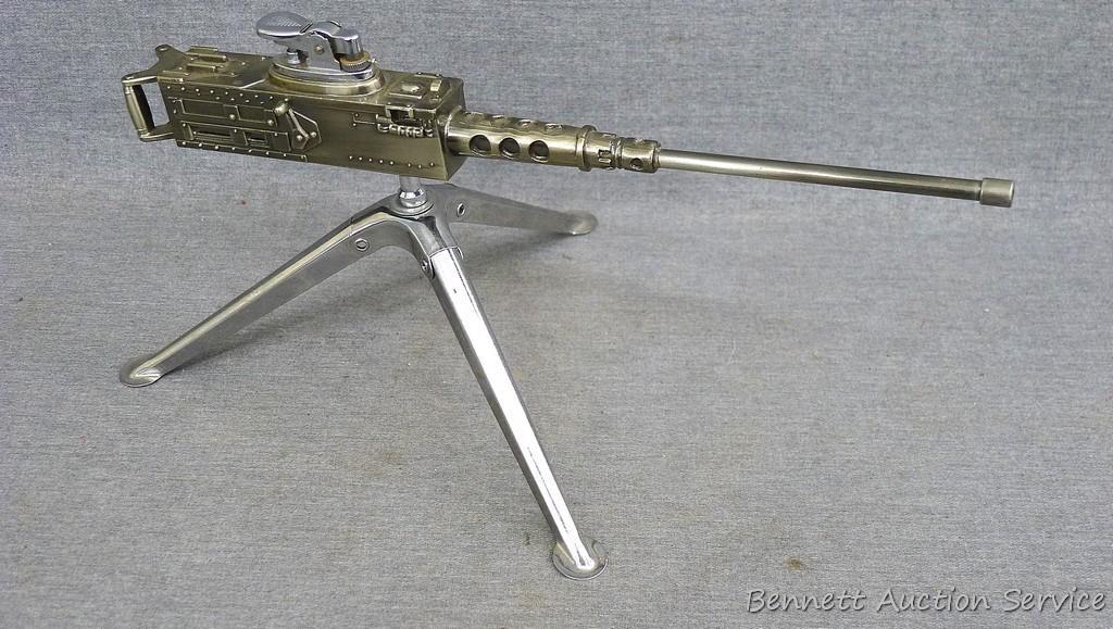 Awesome metal machine gun lighter, 12" long. Flint works.