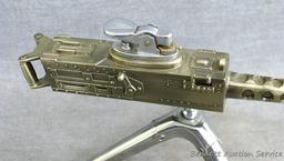 Awesome metal machine gun lighter, 12" long. Flint works.