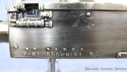 Awesome metal machine gun lighter, 12" long. Flint works.