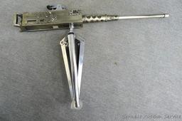 Awesome metal machine gun lighter, 12" long. Flint works.