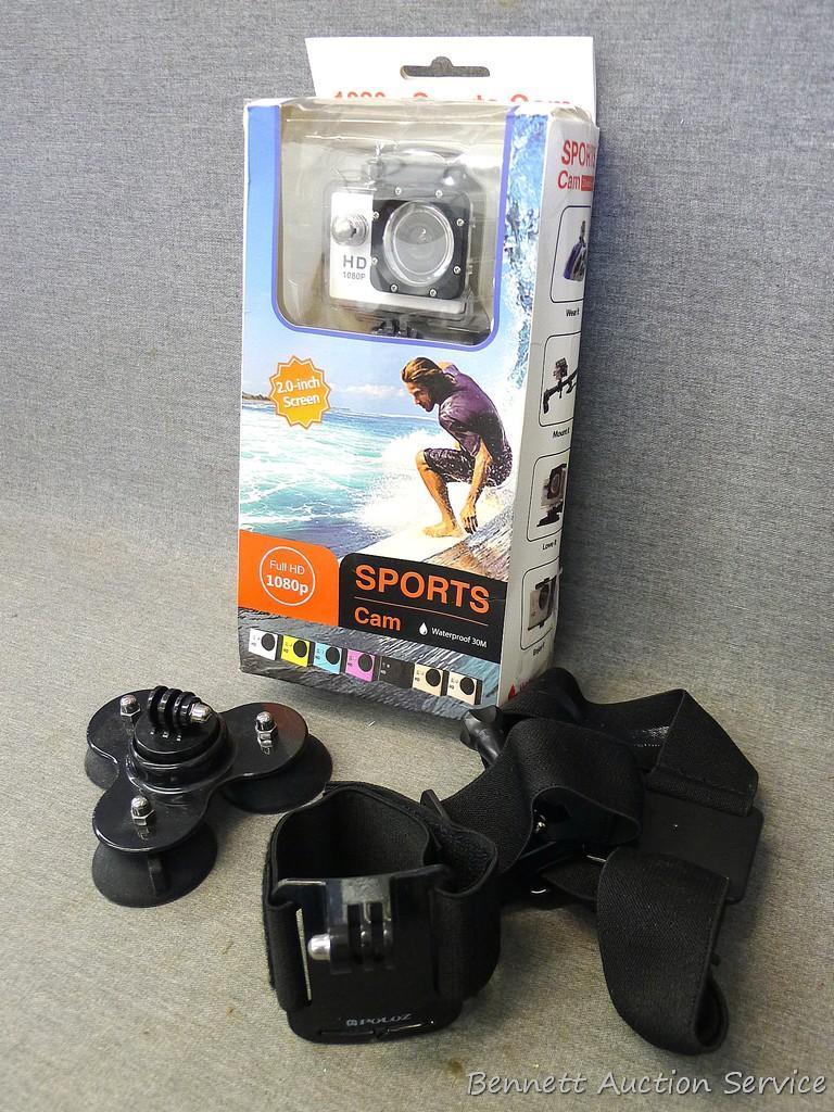 Sports Cam waterproof camera has a 2" screen and full HD 1080p. Includes mounting strap and suction