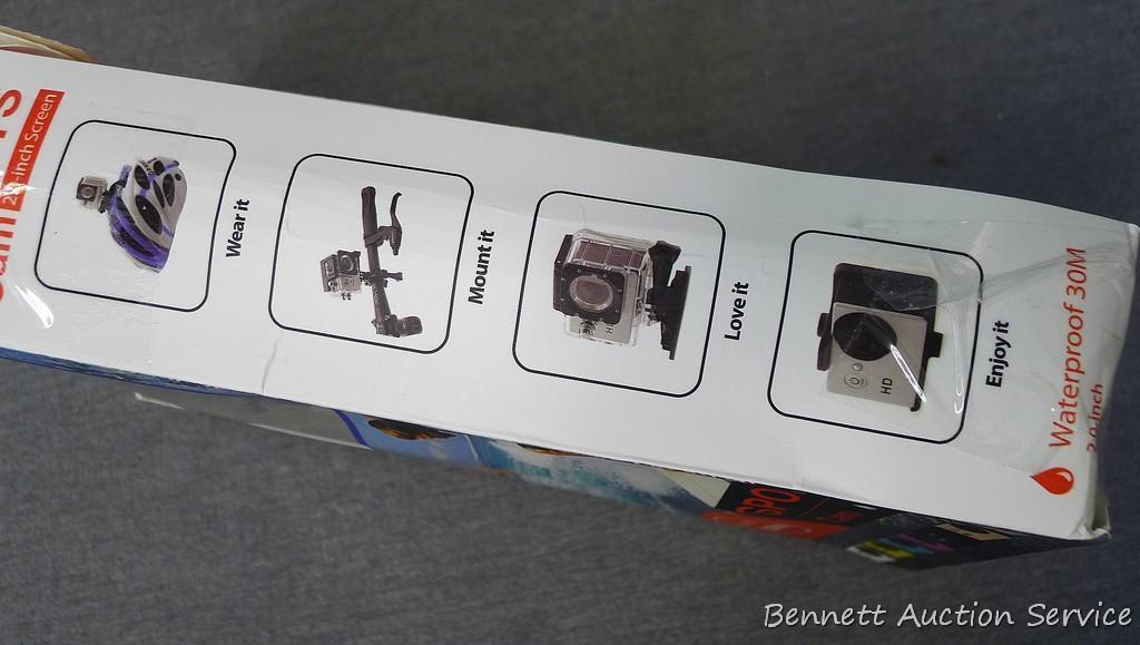 Sports Cam waterproof camera has a 2" screen and full HD 1080p. Includes mounting strap and suction