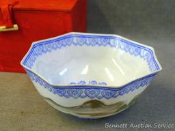 Egg shell porcelain Oriental octagonal bowl depicts mountain scene and comes with storage box. Bowl