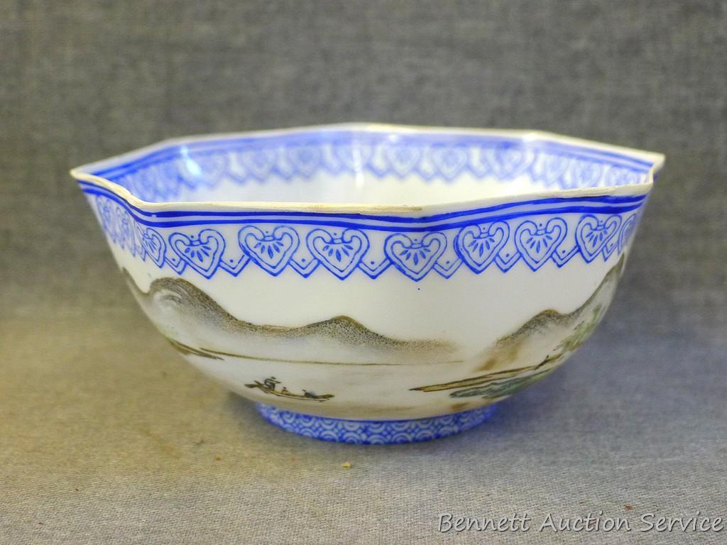 Egg shell porcelain Oriental octagonal bowl depicts mountain scene and comes with storage box. Bowl