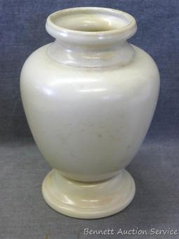 Red Wing magnolia pattern footed vase stands 7-3/4" tall and is in very good condition with no chips