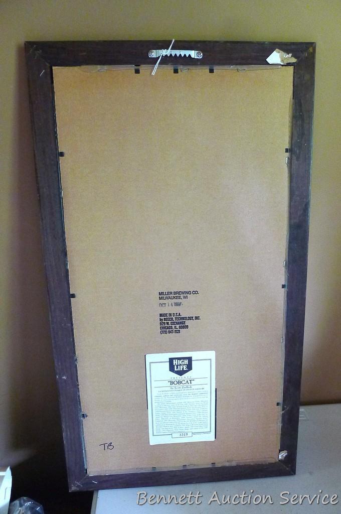 Miller High Life bobcat and hare beer mirror in good condition. Measures approx. 25" x 15" over