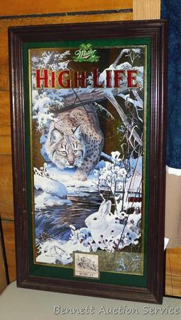 Miller High Life bobcat and hare beer mirror in good condition. Measures approx. 25" x 15" over