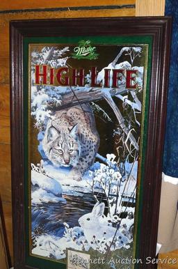 Miller High Life bobcat and hare beer mirror in good condition. Measures approx. 25" x 15" over