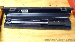 Sears Craftsman 3/8" drive torque wrench includes foot lbs. and newton meters. Comes with plastic