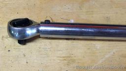 Sears Craftsman 3/8" drive torque wrench includes foot lbs. and newton meters. Comes with plastic