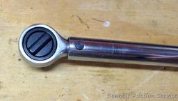 Sears Craftsman 3/8" drive torque wrench includes foot lbs. and newton meters. Comes with plastic