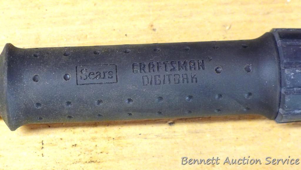 Sears Craftsman 3/8" drive torque wrench includes foot lbs. and newton meters. Comes with plastic