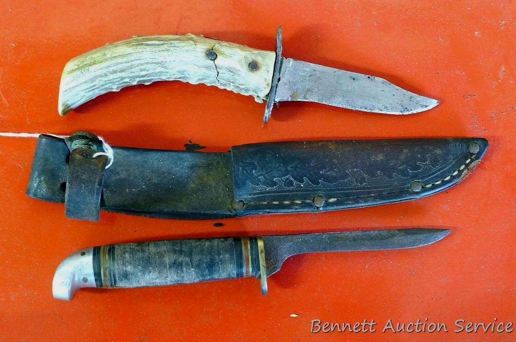 Knife with antler handle, 7" long; well used knife in leather sheaf.