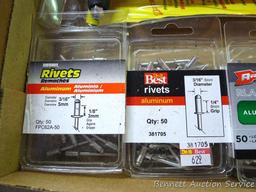 Arrow model RH200 heavy duty rivet tool, includes assortment of rivets.