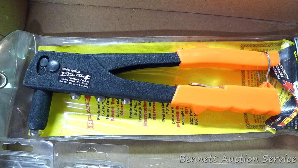 Arrow model RH200 heavy duty rivet tool, includes assortment of rivets.