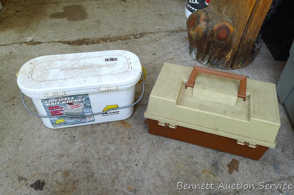 Plano tackle box filled with sinkers, bobbers and fishing lures and more.