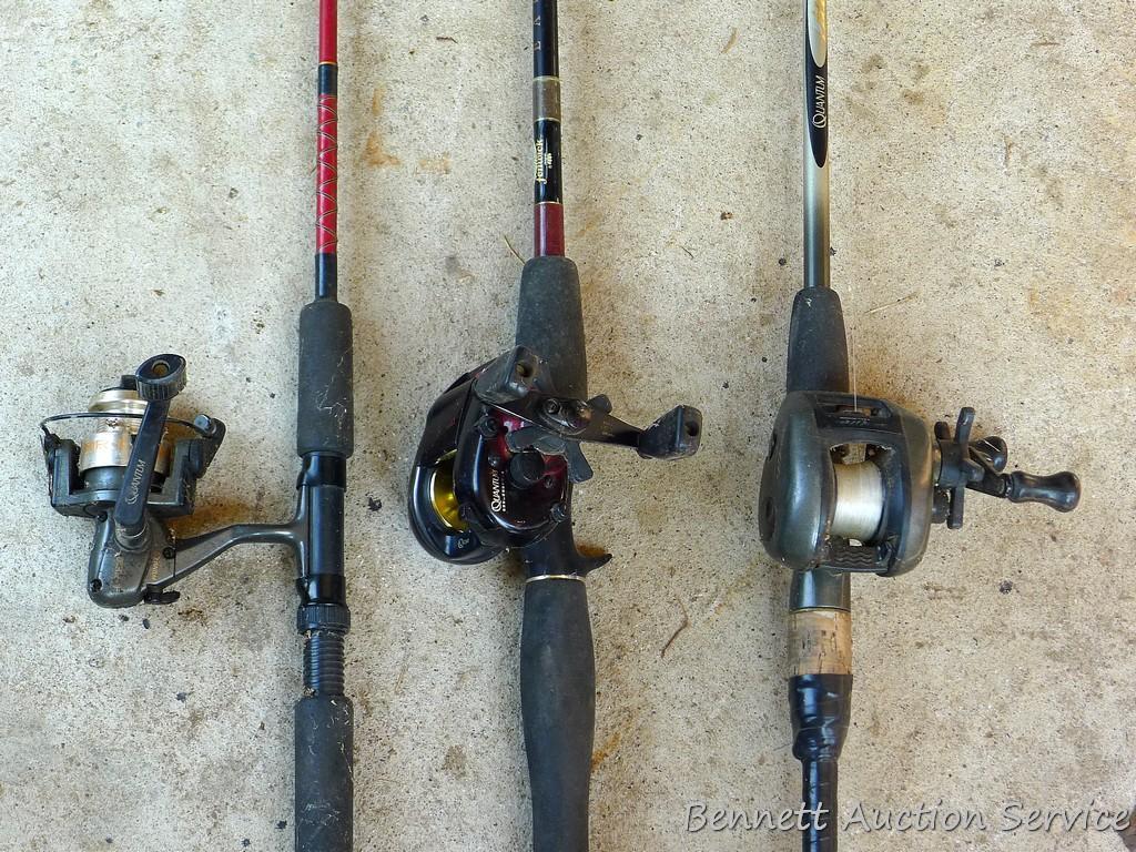 Three fishing rods with reels. One Fenwick rod 78" tall with a Quantam reel, one Quantam rod 74"