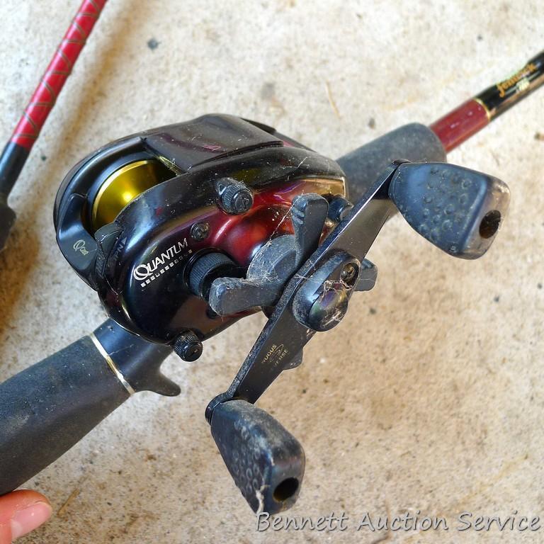 Three fishing rods with reels. One Fenwick rod 78" tall with a Quantam reel, one Quantam rod 74"