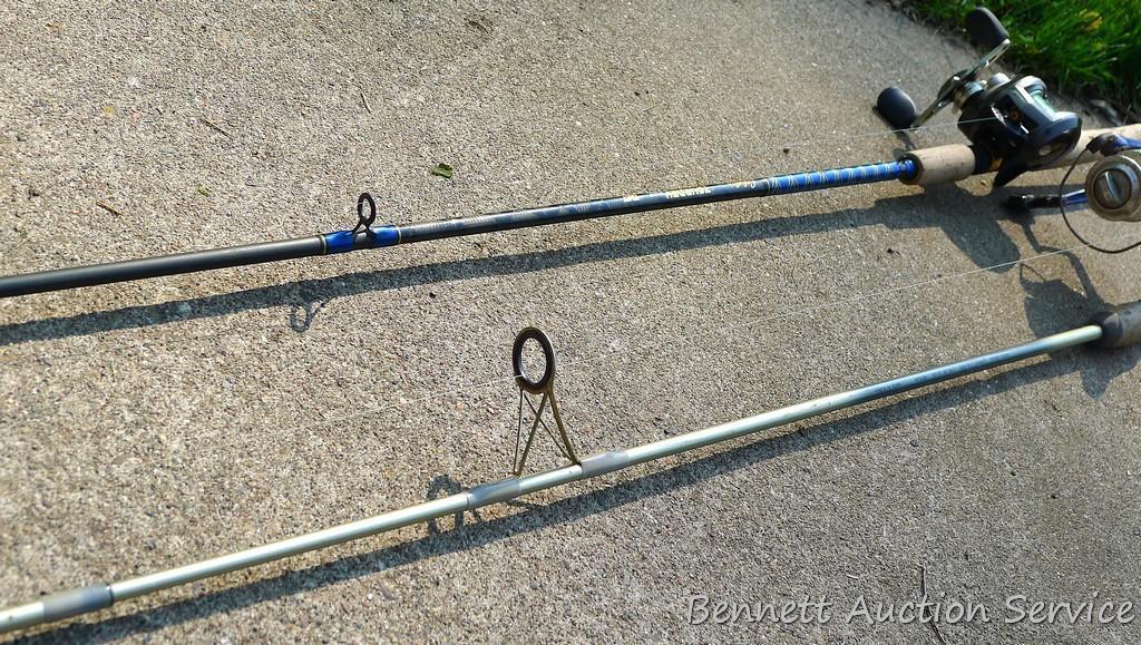 Two fishing rods with reels. One Cabela's Tourney Trail IM7 rod, one Mitchell graphite rod. One has
