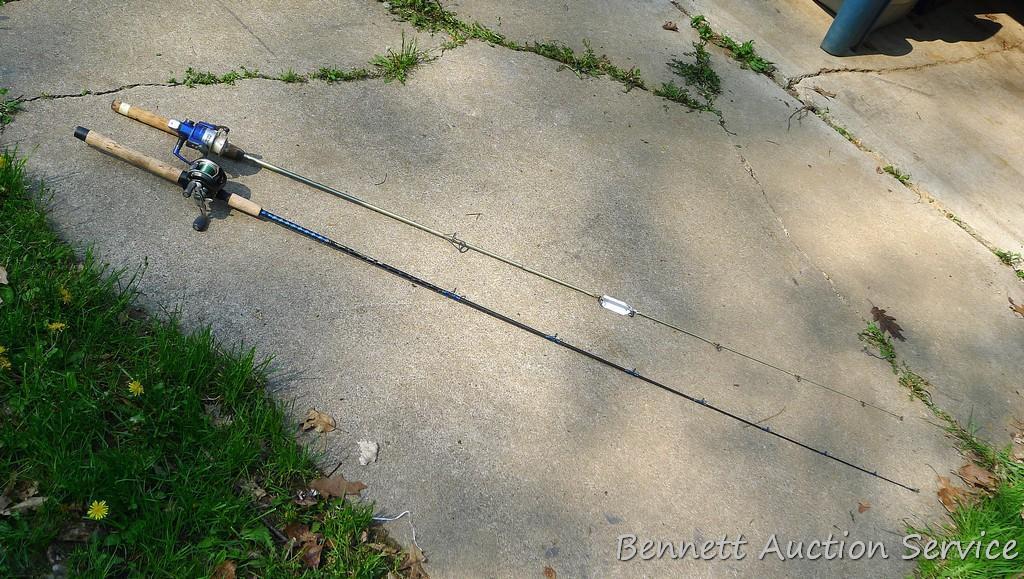 Two fishing rods with reels. One Cabela's Tourney Trail IM7 rod, one Mitchell graphite rod. One has