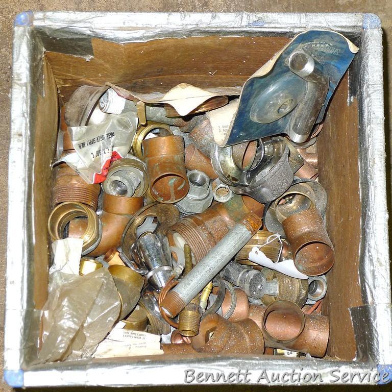 Partial crate full of plumbing fittings, includes nipples, copper and more.