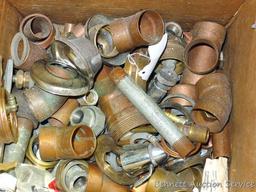 Partial crate full of plumbing fittings, includes nipples, copper and more.
