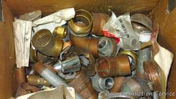 Partial crate full of plumbing fittings, includes nipples, copper and more.