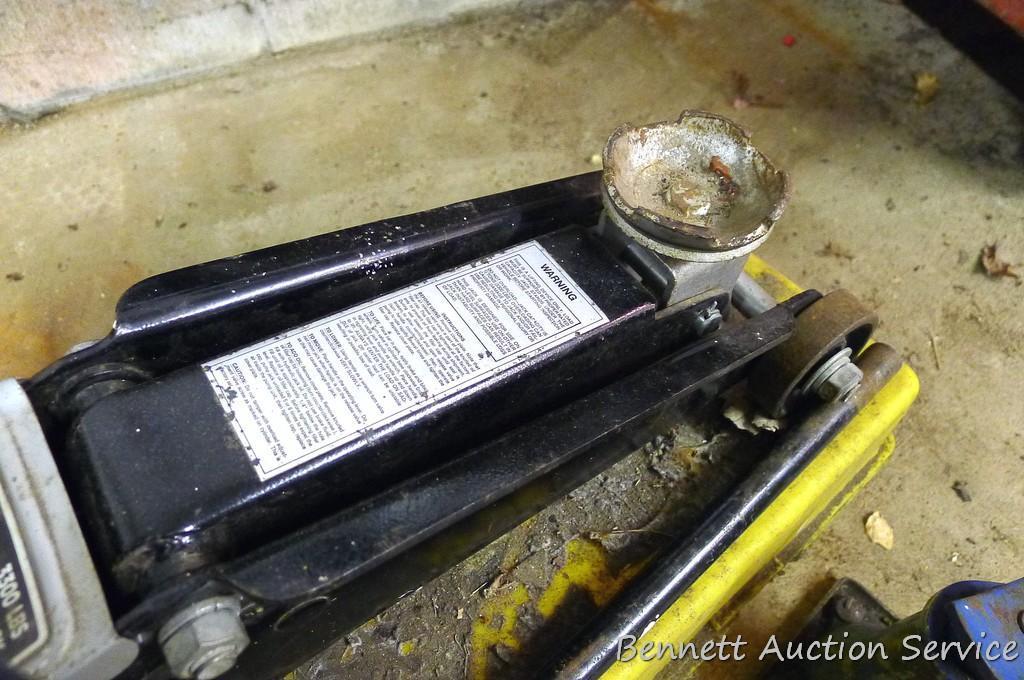 Sears hydraulic floor jack with handle. Lifts 3,300 lbs. Model #214.125100. Comes in plastic