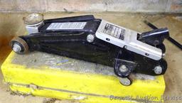 Sears hydraulic floor jack with handle. Lifts 3,300 lbs. Model #214.125100. Comes in plastic