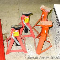 Two automotive 3 ton jack stands in good shape, stand 11" tall; 2 lighter duty jack stands.
