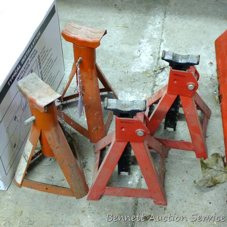 Two automotive 3 ton jack stands in good shape, stand 11" tall; 2 lighter duty jack stands.