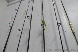 Five fishing rods with reels, tallest is 80" includes Cardinal with a graphite rod; St Croix; Zebco