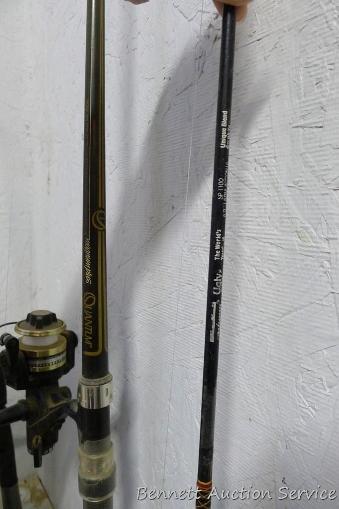 Five fishing rods with reels, tallest is 80" includes Cardinal with a graphite rod; St Croix; Zebco