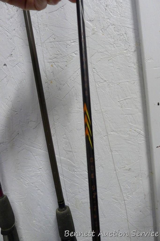 Five fishing rods with reels, tallest is 80" includes Cardinal with a graphite rod; St Croix; Zebco