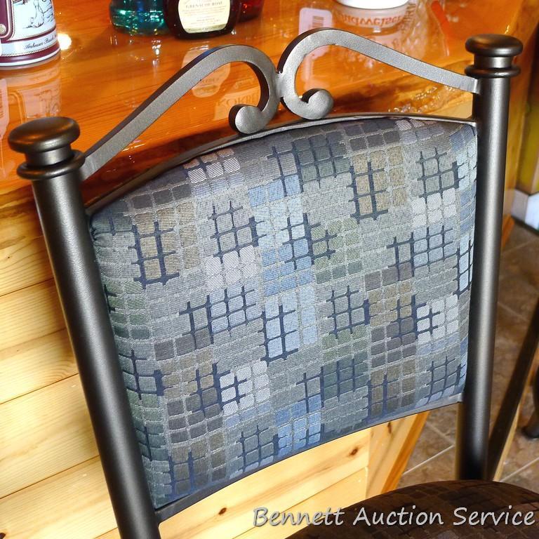 Pair of sturdy steel framed swiveling bar, bistro or coffee shop stools. Stand 45" to top of back,