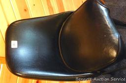 Steel framed swiveling bar stool is 43" tall. Nice and sturdy, vinyl in good condition.