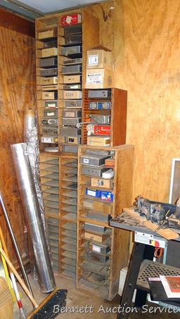 Shelving, boxes and contents. Includes hinges, screws, chain repair links and more.