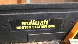 Wolfcraft Router station no. 640 mounted on metal stand. Includes bits; Craftsman router guide;