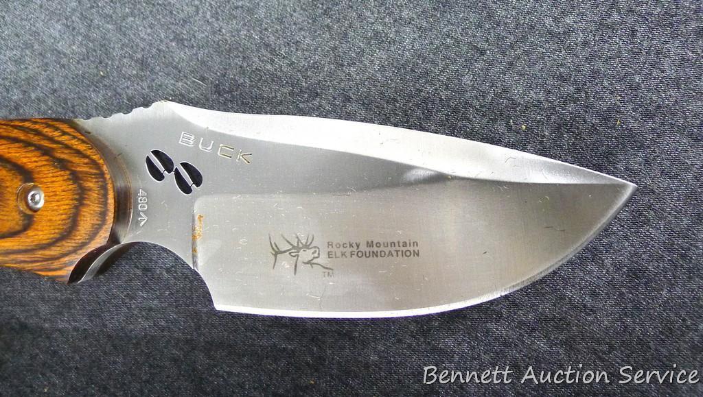 Buck hunting knife with a beautiful wood handle, model 480; has Rocky Mountain Elk Foundation on the